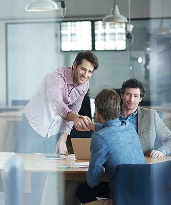 shaking hands in a meeting