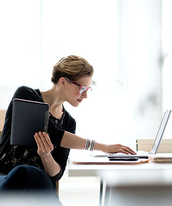 woman typing in a computer